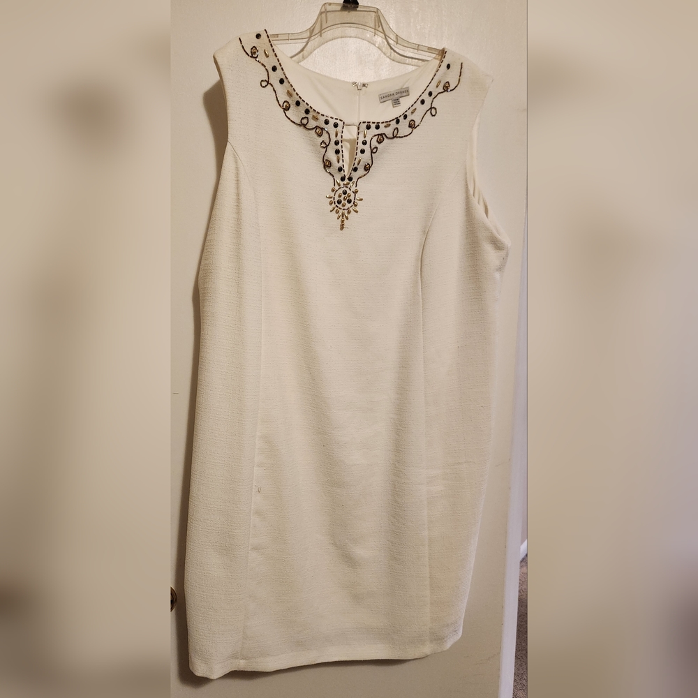 White linen-look lined dress with bronze neckline details